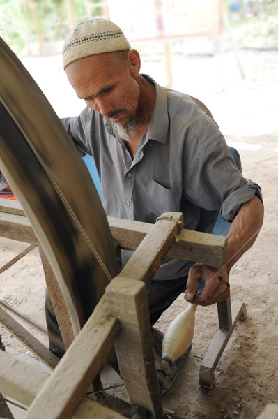 Rouet pour extraction artisanale de la soie, Hotan, Chine