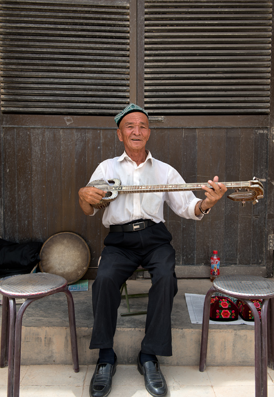 Musicien, grottes de Bezeklik, Xinjiang, Chine