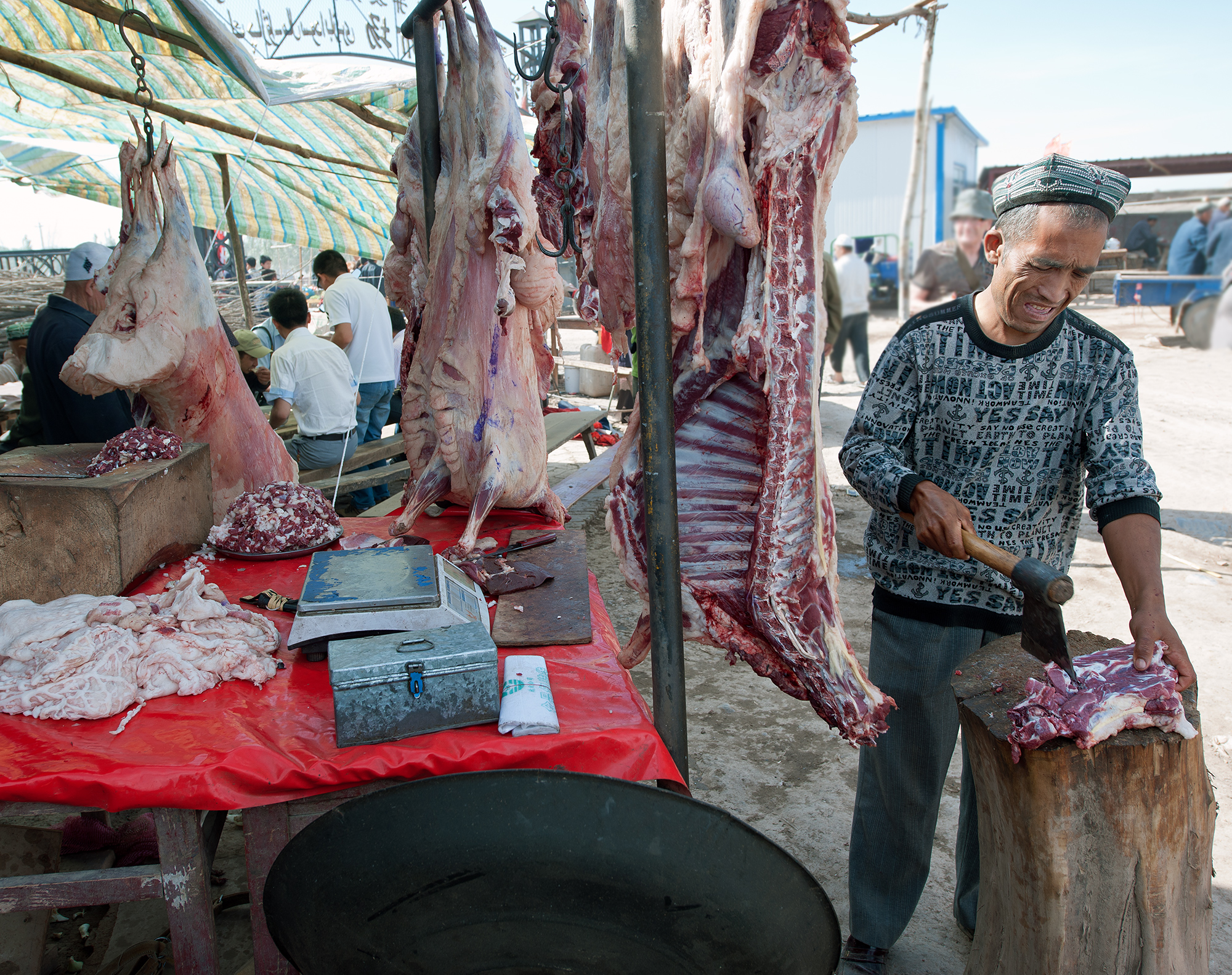 Boucher préparant de l'agneau, Kashgar