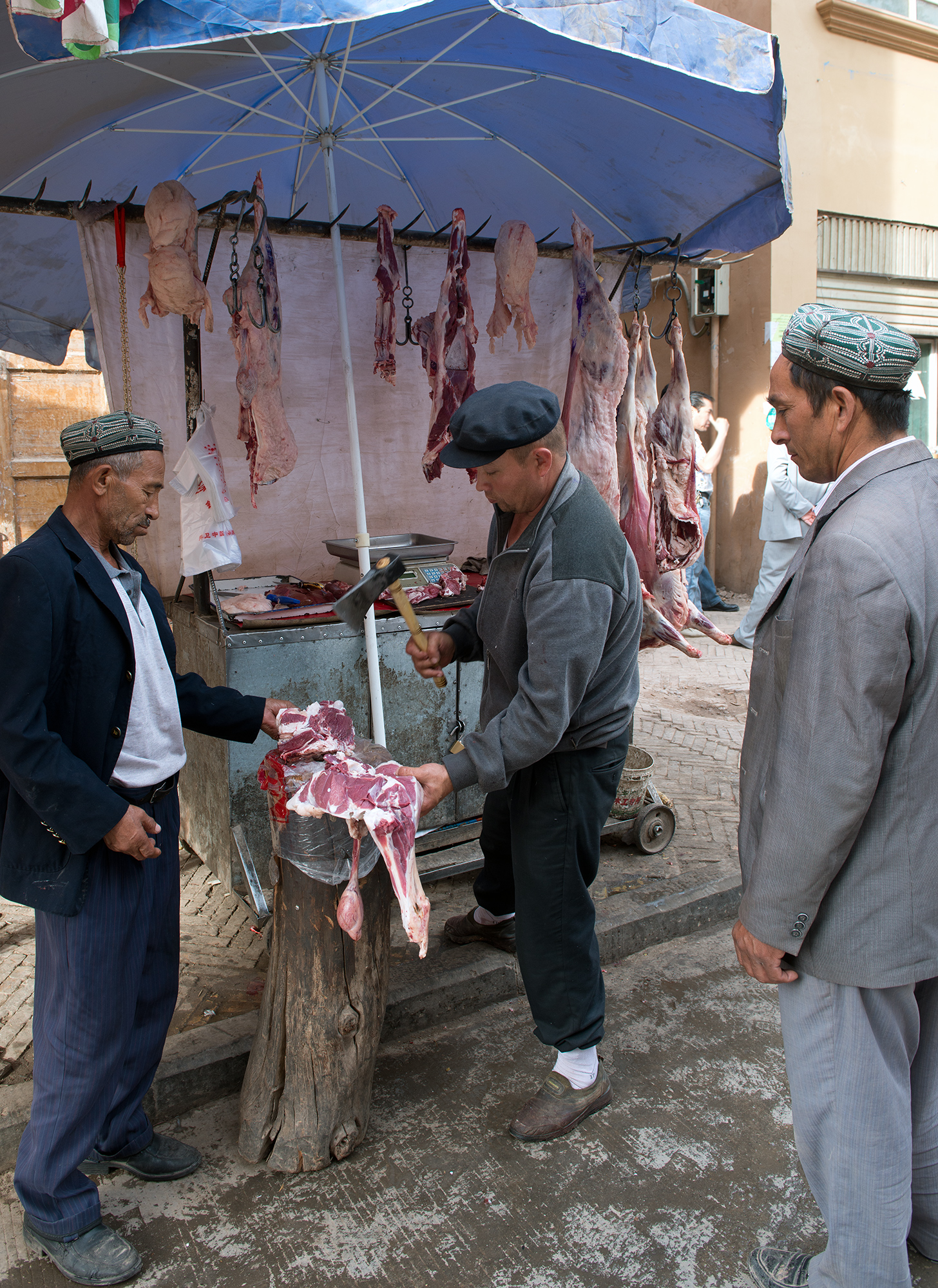 Boucher ouïghour dans la rue, Kashgar