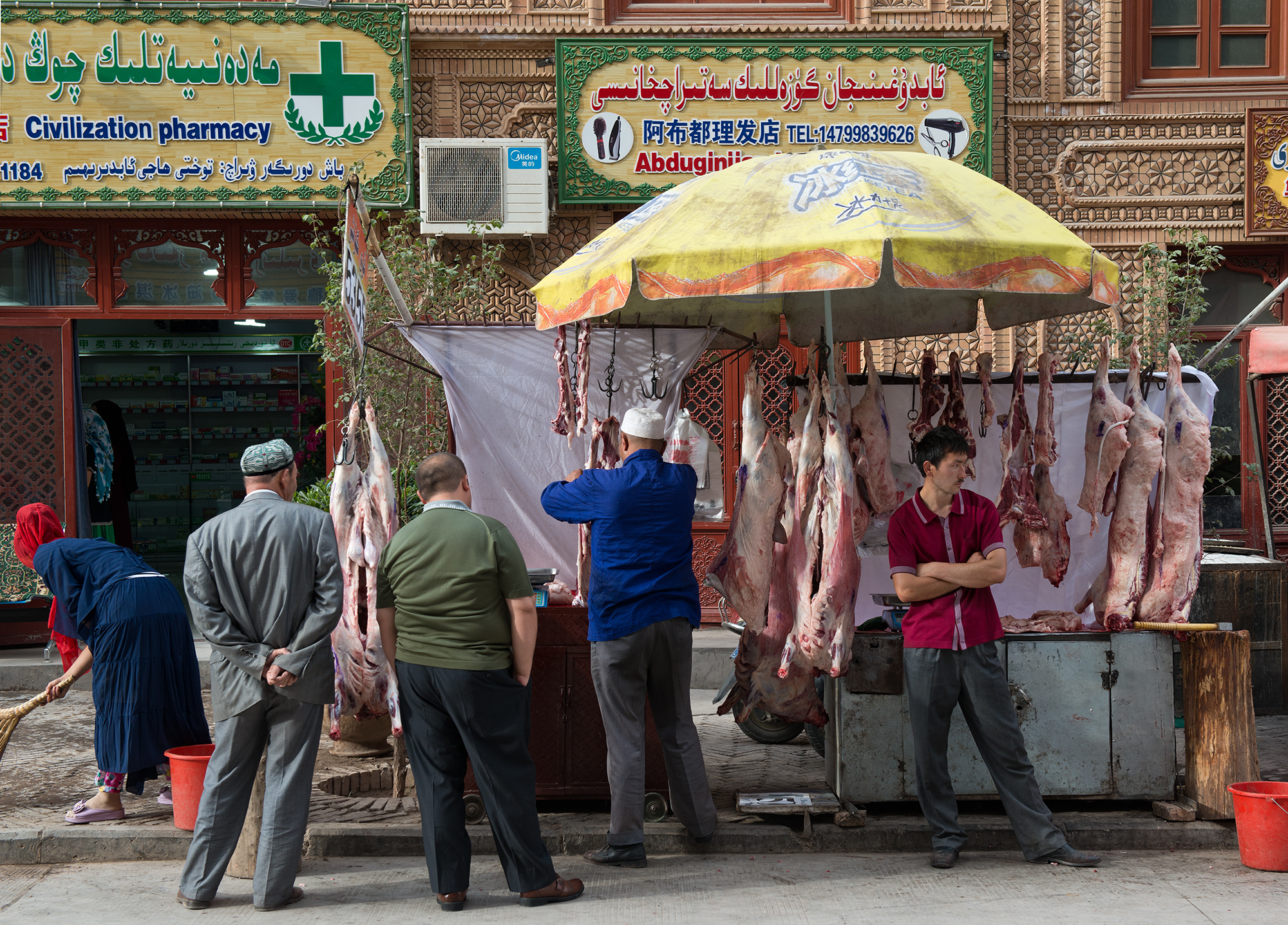 Boucher ouïghour dans la rue, Kashgar